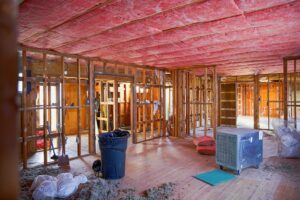 a room with a wood floor and a red ceiling